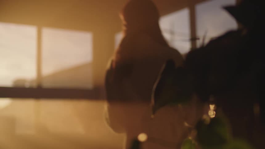 Woman walking in house