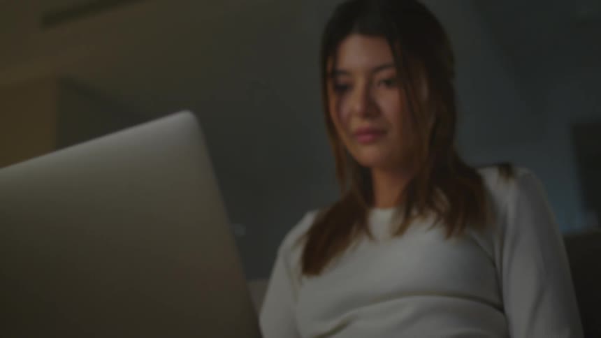 A woman using a laptop