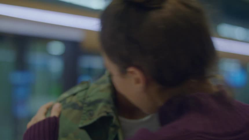 A military woman returning back from deployment