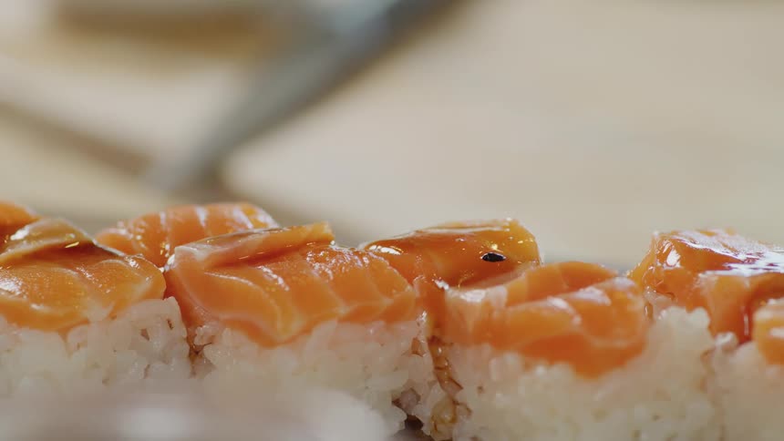 Person preparing sushi