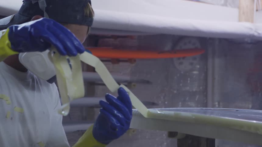 Person removing tape