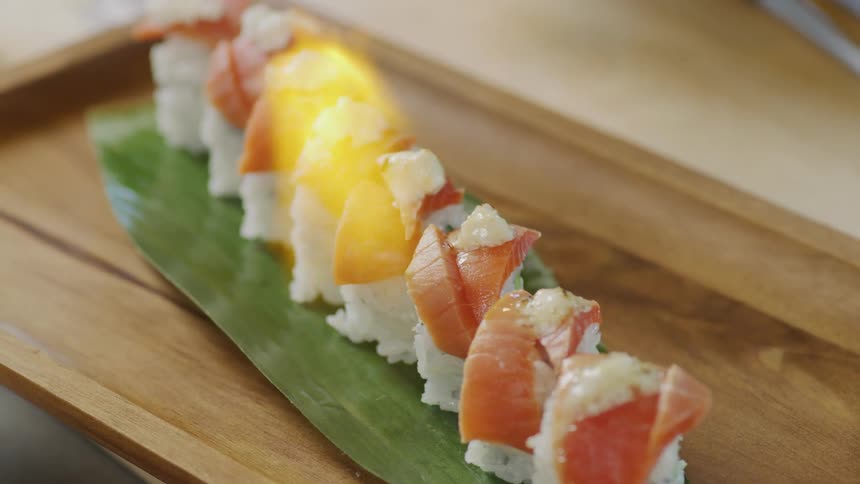 Person preparing sushi