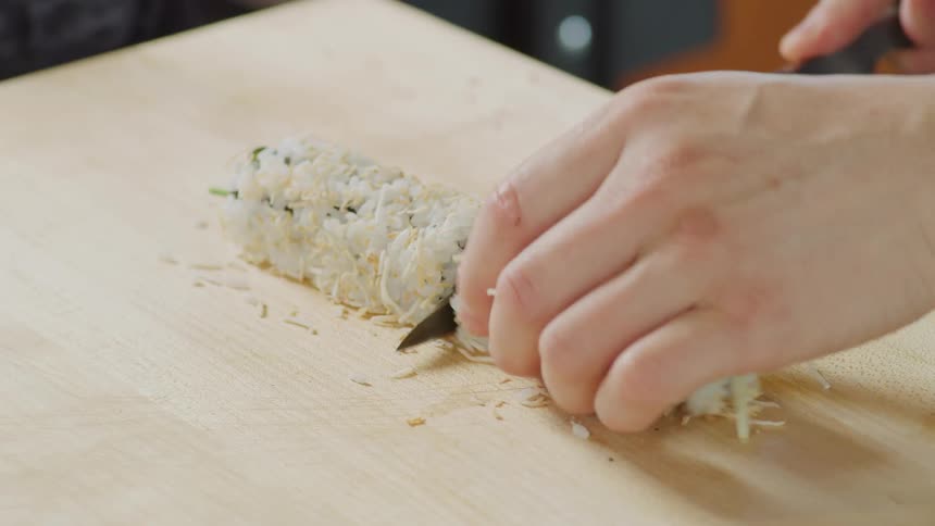Person preparing sushi