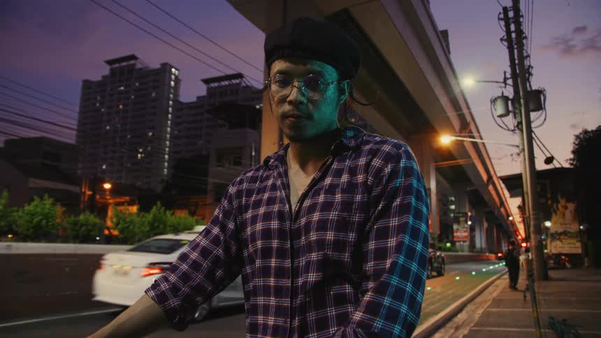 A man standing downtown