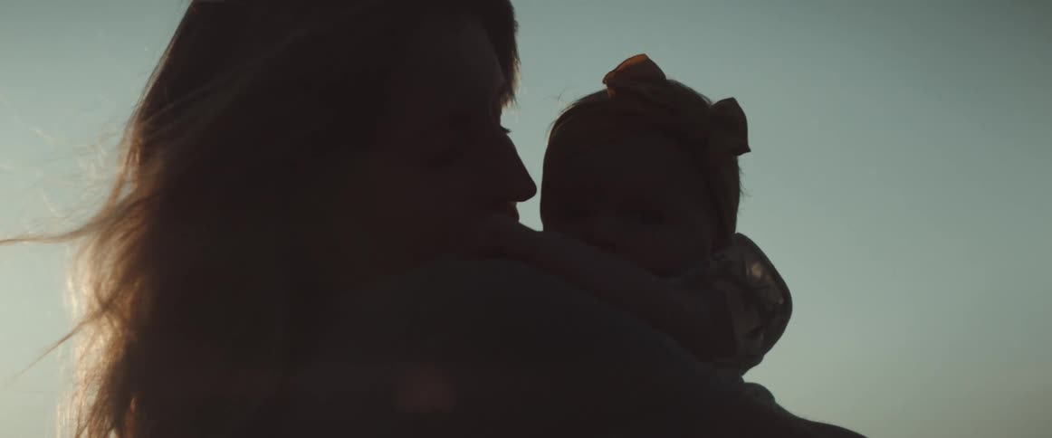 Woman holding child