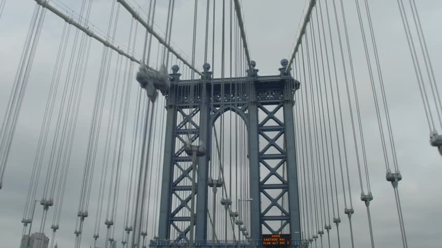 Moving over a large bridge on a cloudy day