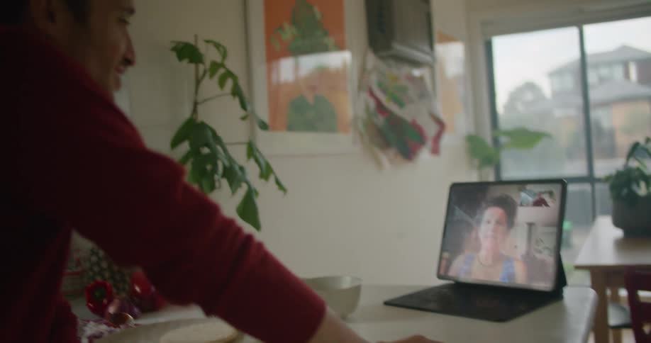 Person talking on laptop