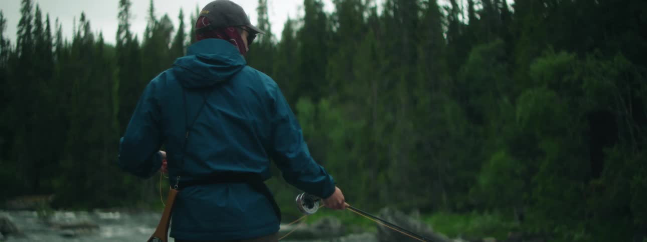 Two men fishing in a river