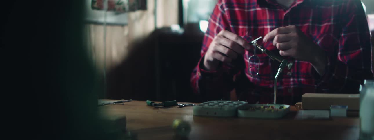 Person turning string