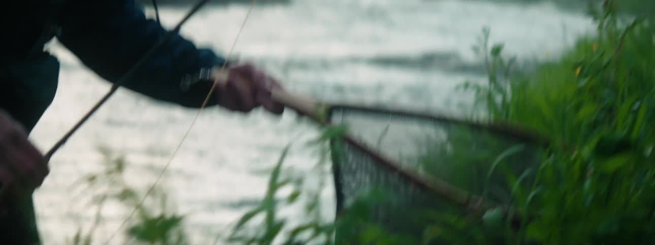 Person fishing outdoors