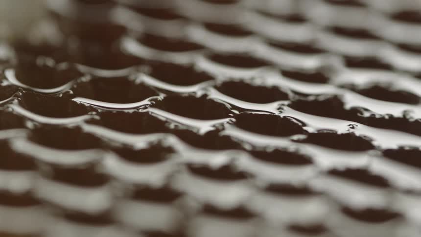 Light and shadow play on a honeycomb link patterned surface