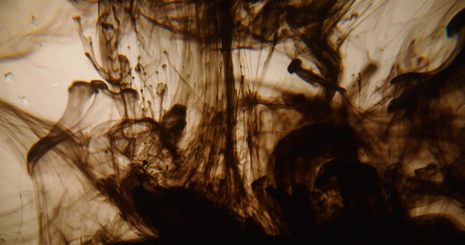 Ink slowly sinks in opaque liquid