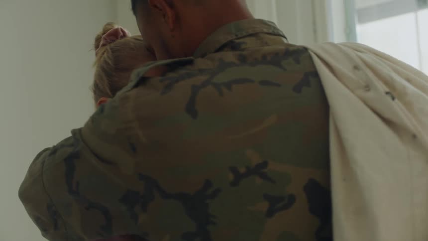Man hugging wife
