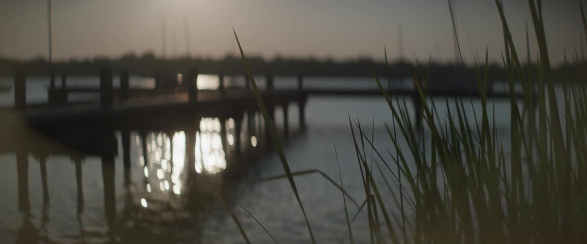 A shot of a pier at a lake