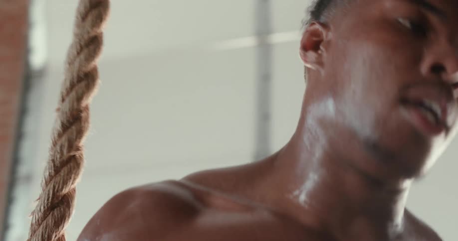 A man doing a workout in a gym