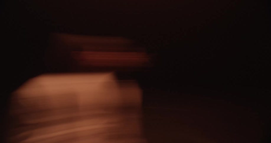 The image of a person blurs as they spin round and round