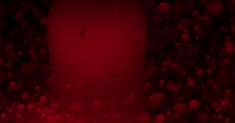 A view of bubbles in red fluid