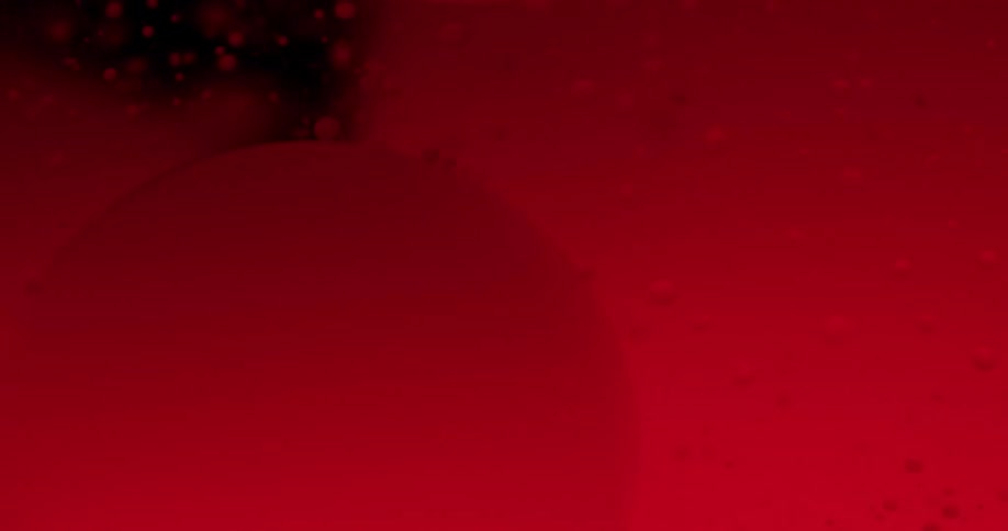 Red orbs float through a dark liquid