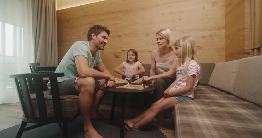 A family sitting and talking at a table