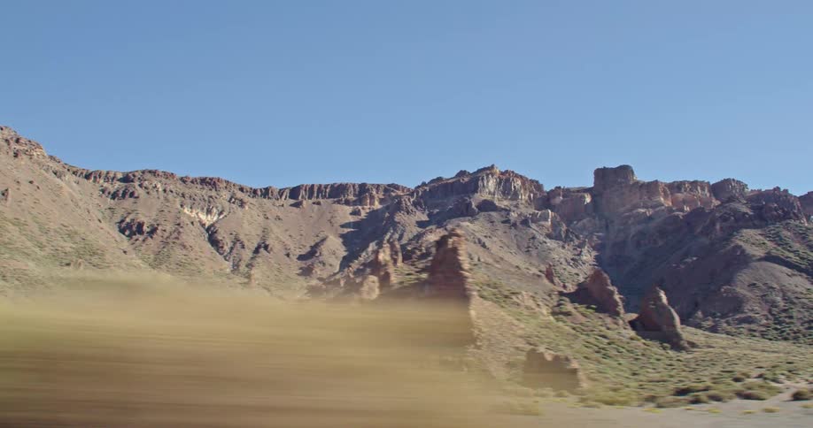There are mesas and other rock formations in a landscape