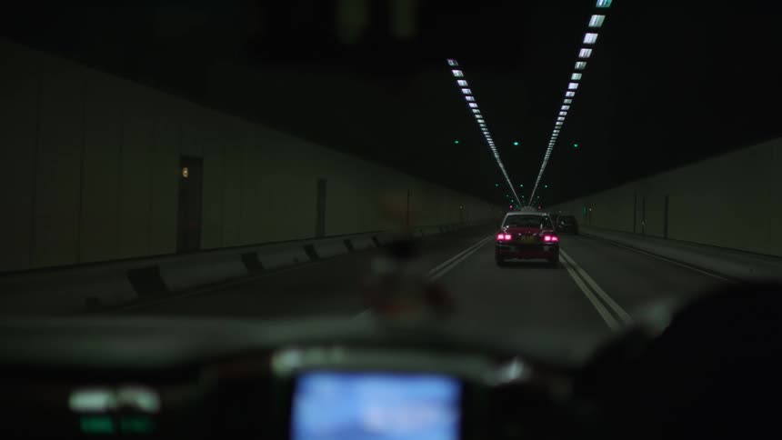 Cars driving through a tunnel