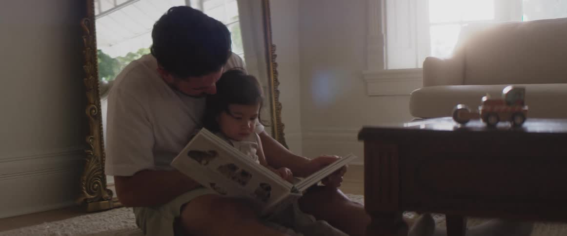 Father reading with child