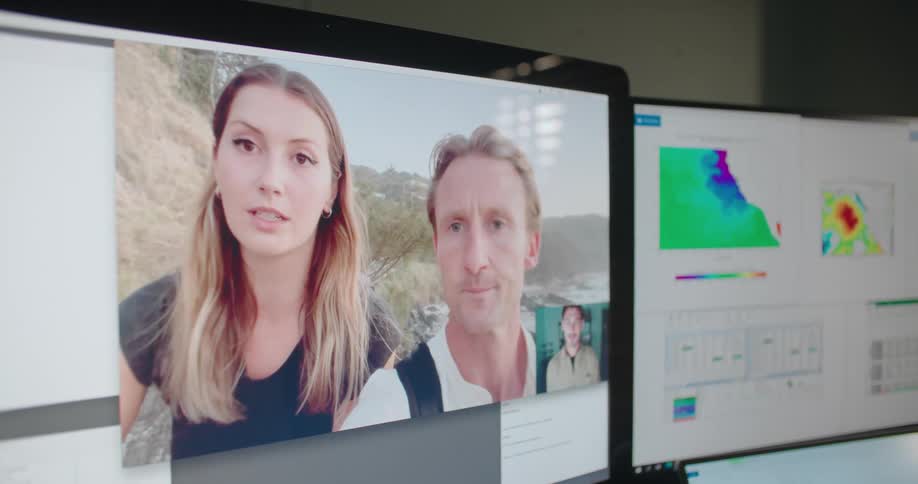 Talking to two people on a computer