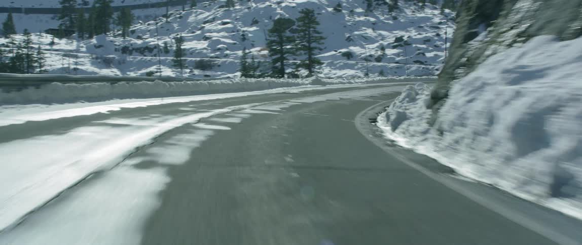 Moving along a winding road on a winter day