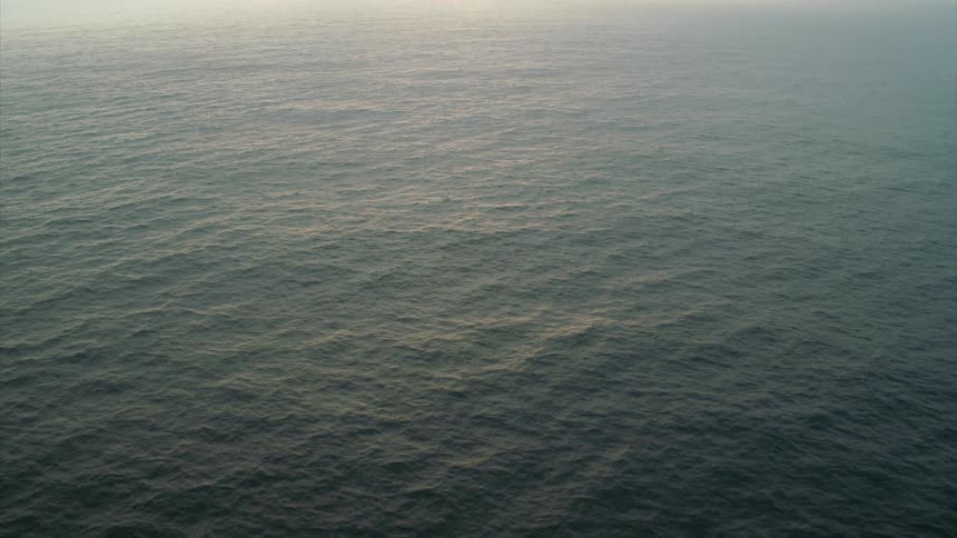 The ocean with the sky in the background
