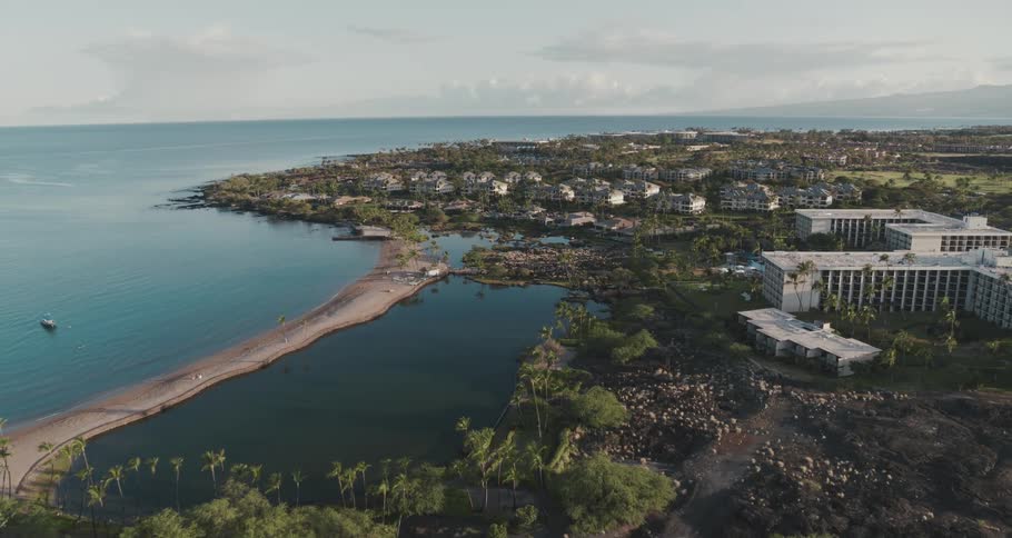 Aerial view of a small coastal town near the beach close to the ocean