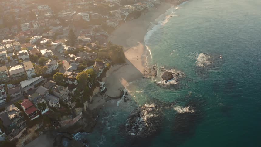 An aerial view of a neighborhood near the coast