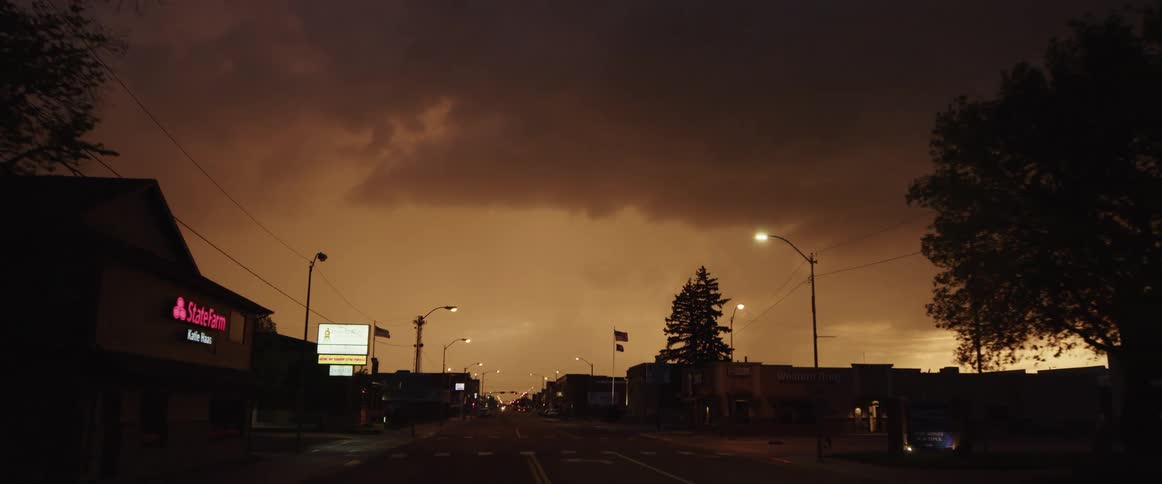 Lightning flashes in the sky above the town