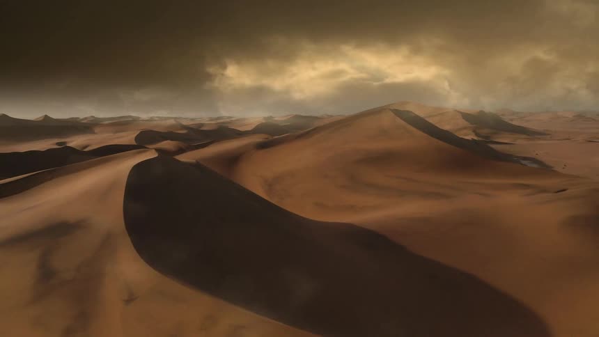 Vast sand dune hills on a cloudy day