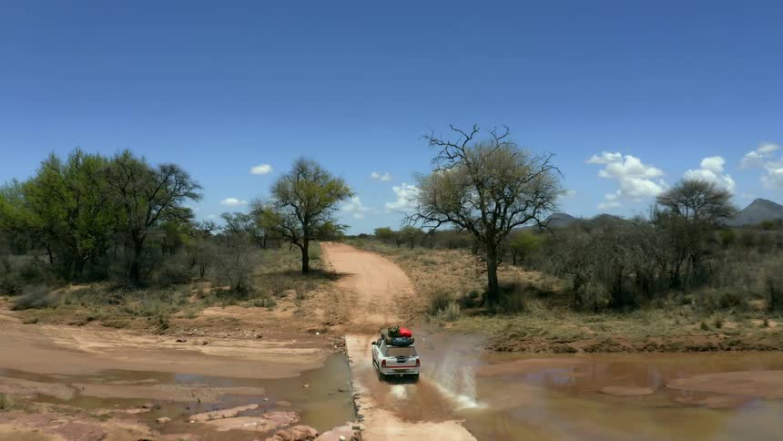 A vehicle is driving off road