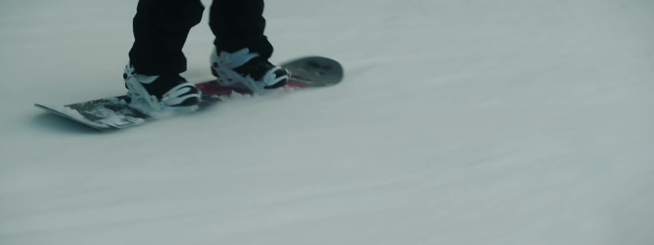 A person snowboarding down a mountain