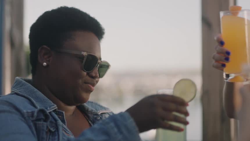 Black woman taking a drink