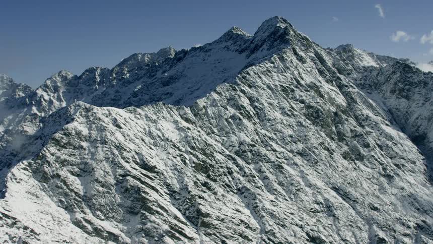 Snow and ice cover the mountains