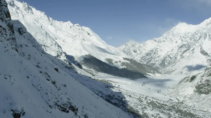 The mountain is covered with ice and snow