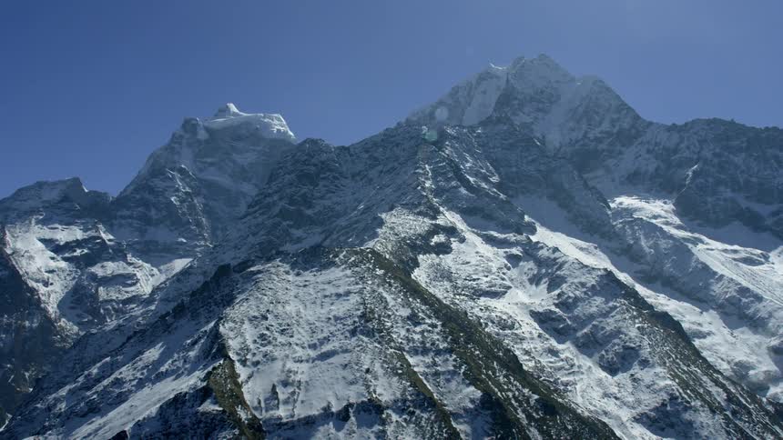 Snowy white mountains during the day