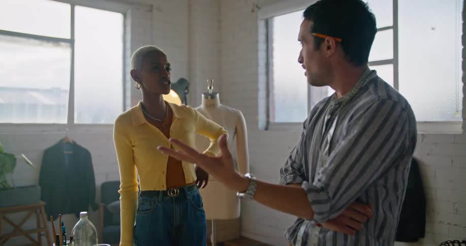 Two coworkers talking with each other