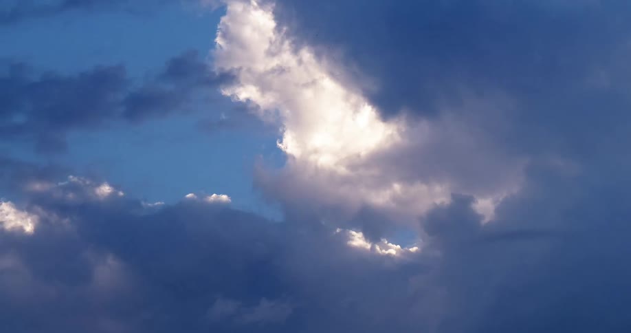 Storm clouds move across the sky