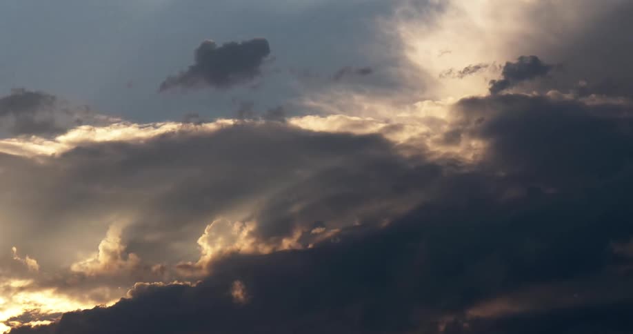 A sky with clouds and sunlight