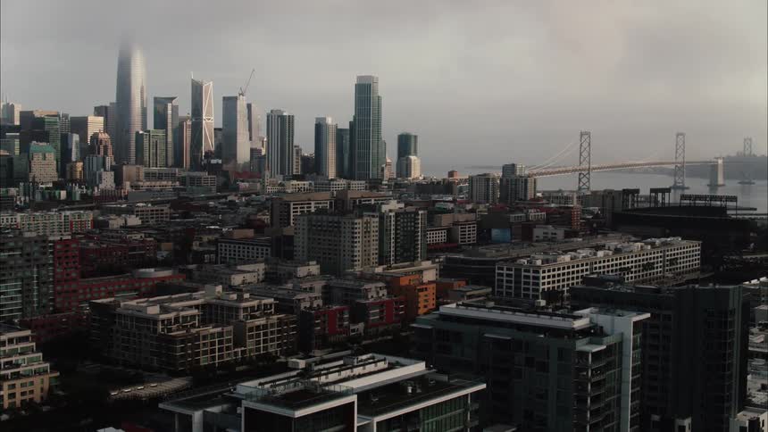 Aerial view of the san francisco city skyline near the bridge at morning
