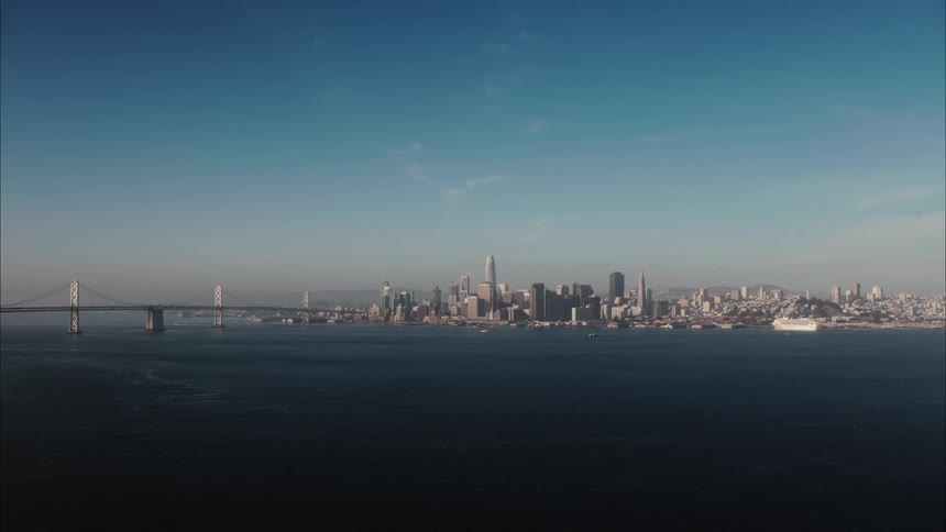 Aerial view of the san francisco city skyline near the bridge at morning