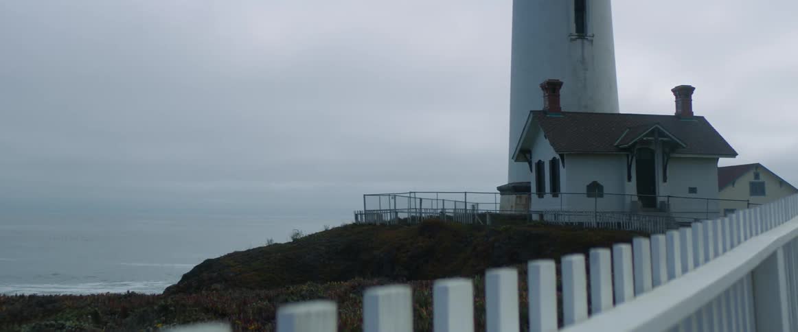 A lighthouse sitting on the shore