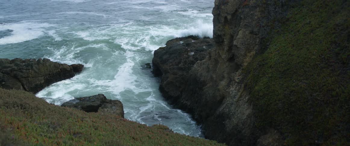 A view of waves crashing against cliffs