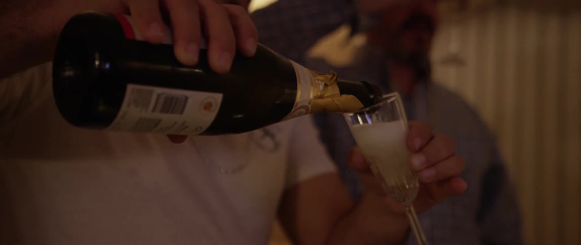 A man passes around drinks