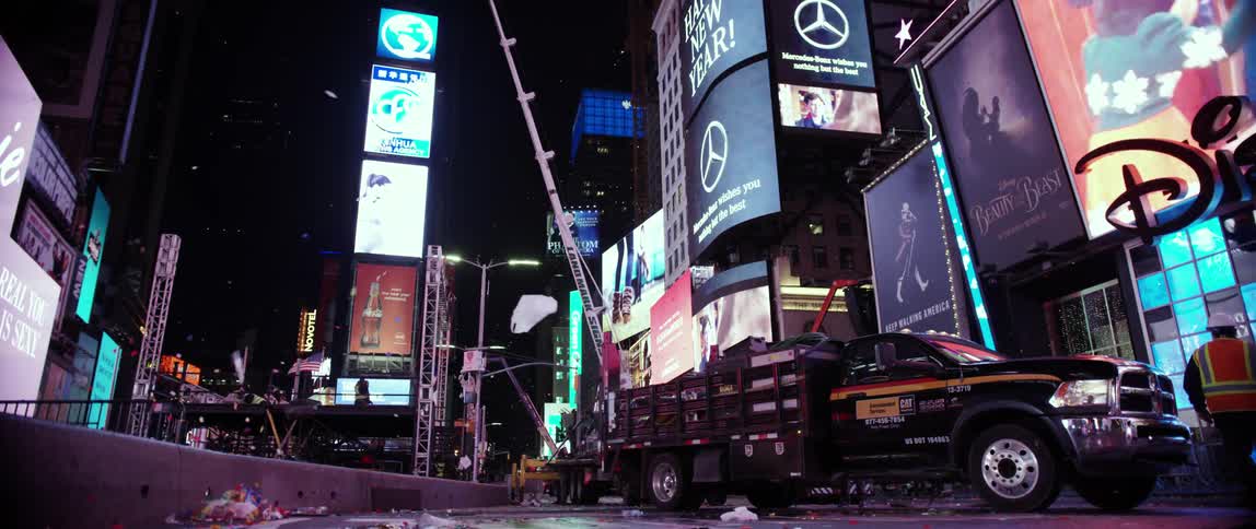 Ticker tape falls in a city sky