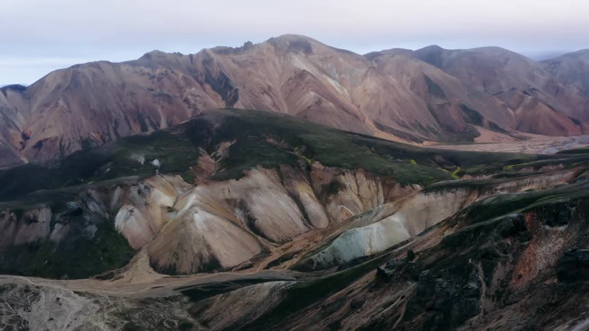 Mountain ridge under a cloudy sky