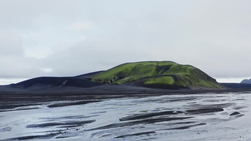 Green slopes of a hill on a volcanic area